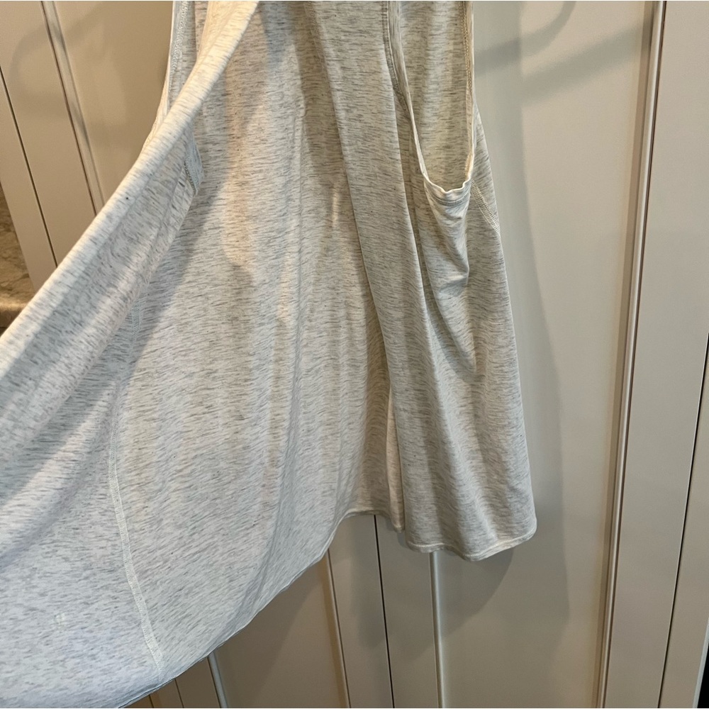 Lululemon tank top in light heathered gray. Size 4. Excellent condition